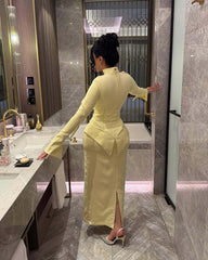 فستان سهرة أصفر بتصميم فريد ولمسة عصرية