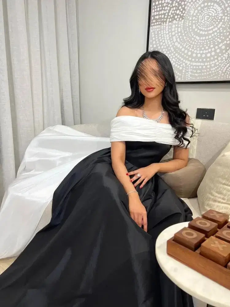 فستان سهرة اسود وابيض راقي انيق