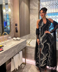 فستان سهرة أسود فاخر بتطريز كريستالي وأكمام شيفون – تصميم ملكي جذاب